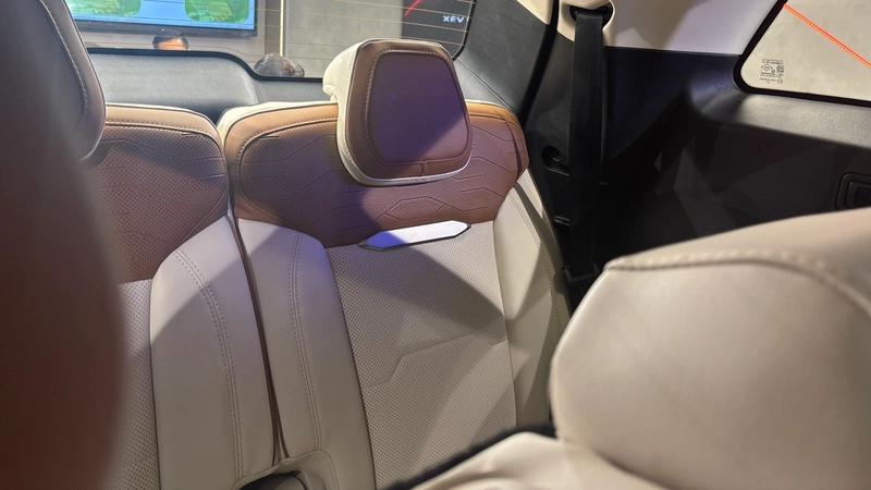 Third row headrest and seat upholstery