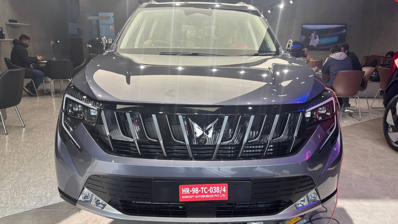 Front view showing piano black grille and LED headlamps
