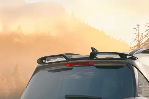 At the rear, it features a stylish new wing-type spoiler.