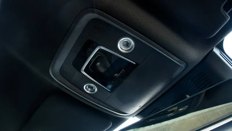 Front overhead console with reading lights and interior controls