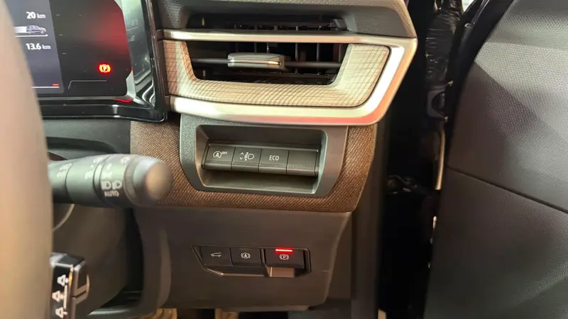 Adventure driver side air vent controls and drive mode buttons closeup