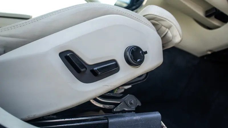 Front seat adjustment controls