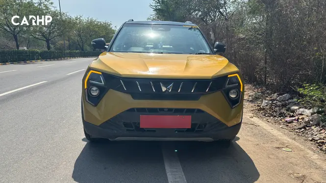 Mahindra XUV 3XO in yellow front profile
