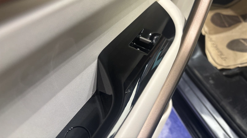 Passenger side window switch panel close up