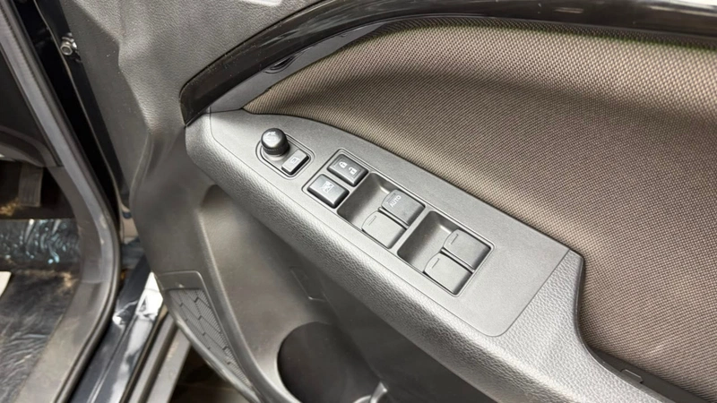 Maruti Suzuki Brezza Driver-side power window controls