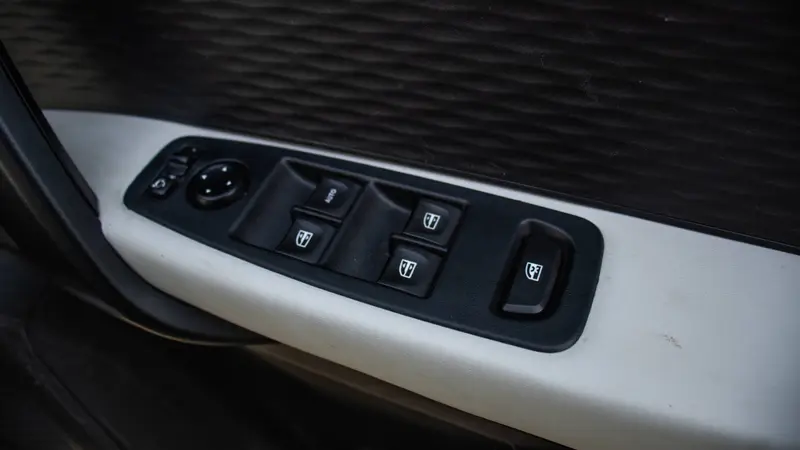 driver-side door with power window and ORVM controls
