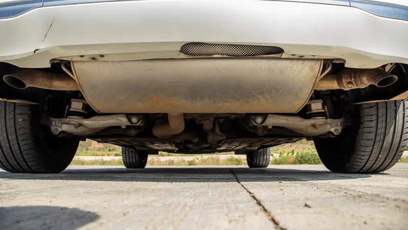 Rear suspension and exhaust