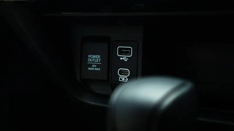 Front charging ports with a 12V 180W power outlet, USB-A port and USB-C charging port