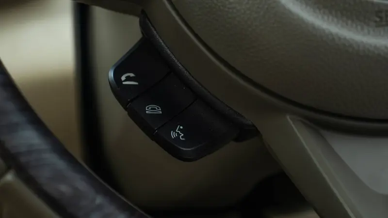 steering-mounted audio controls