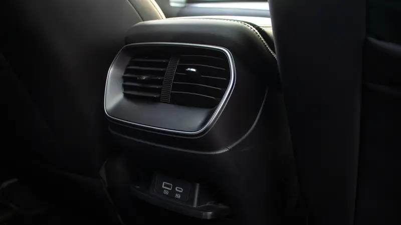 Rear central air vents and rear USB charging ports