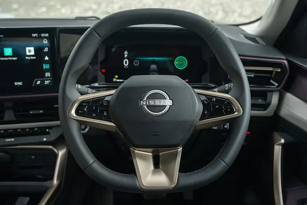 The Tekton gets a three-spoke dual-tone steering wheel with mounted controls.