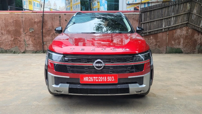 front view with Nissan grille and connected LED headlamps