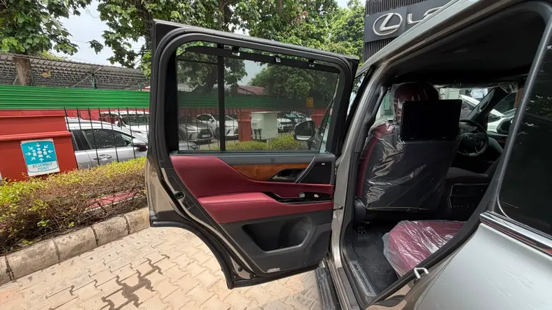 rear door with sunshade and red leather interior