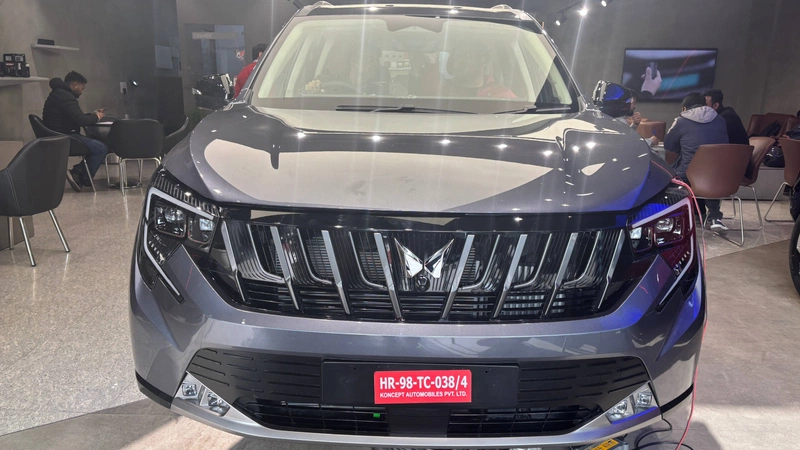 Front view showing piano black grille and LED headlamps