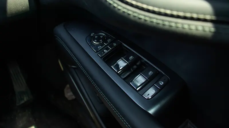 Driver-side power window, door lock and exterior mirror controls