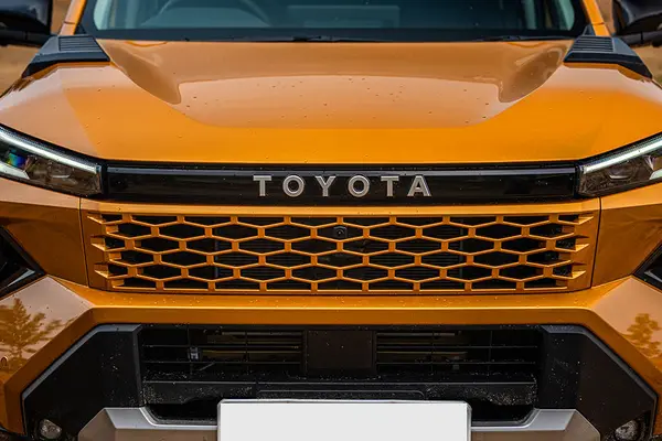 The new Hilux gets a new front end with a hexagonal-pattern grille.