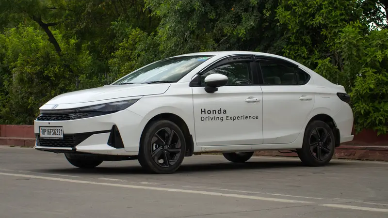 Front three-quarter view showing the alloy wheels and sharp body lines