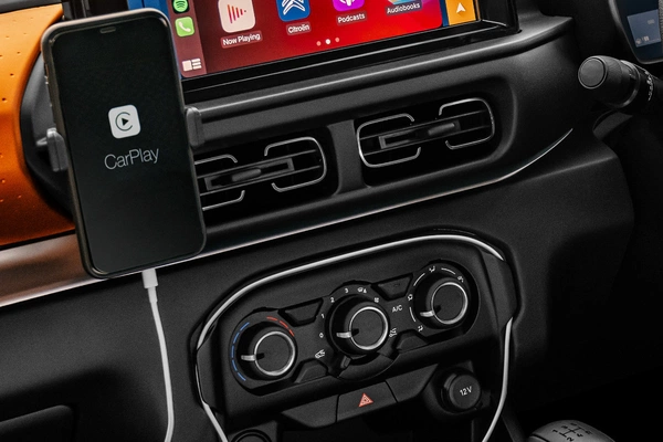 Phone dock with cable tidy.