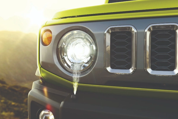 Headlight washers keep lenses clear in muddy or dusty conditions.