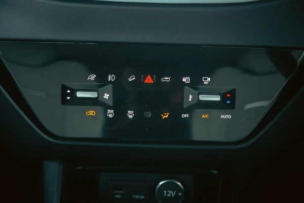 Touch-based climate control panel.