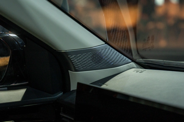 12-speaker JBL system with soundbar produces immersive audio.