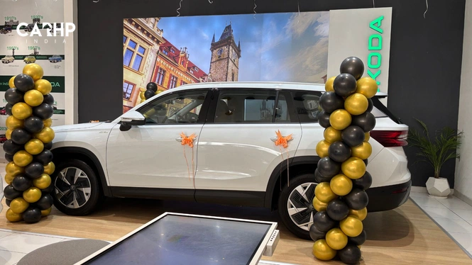 Side profile of white 2025 Skoda Kodiaq