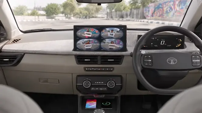Tata Aeris Interior Front Cabin Showing DVR. Fashboard, Steering Wheel, Center Console. Wireless Charging