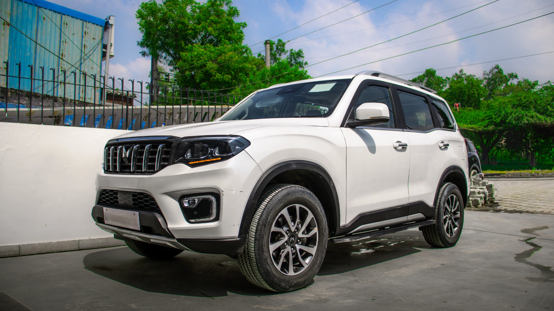 Scorpio N White front side view