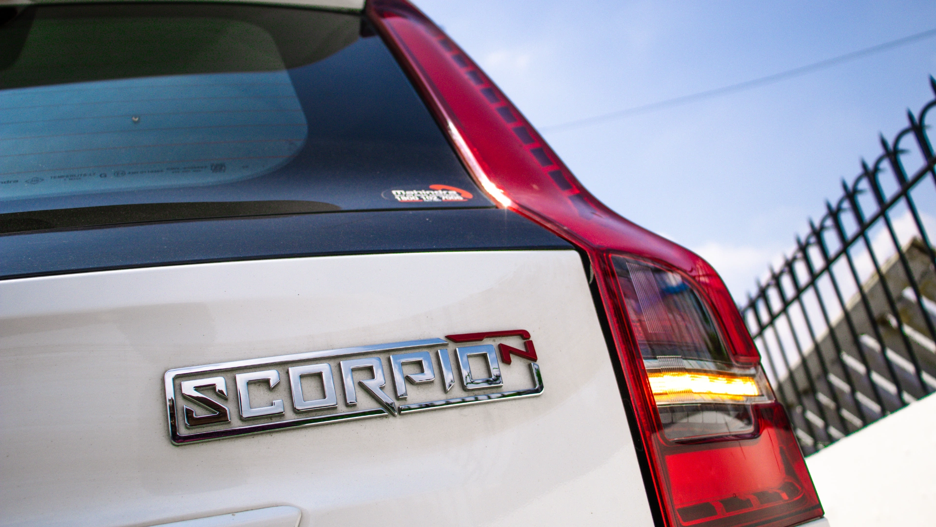 Scorpio N White badge