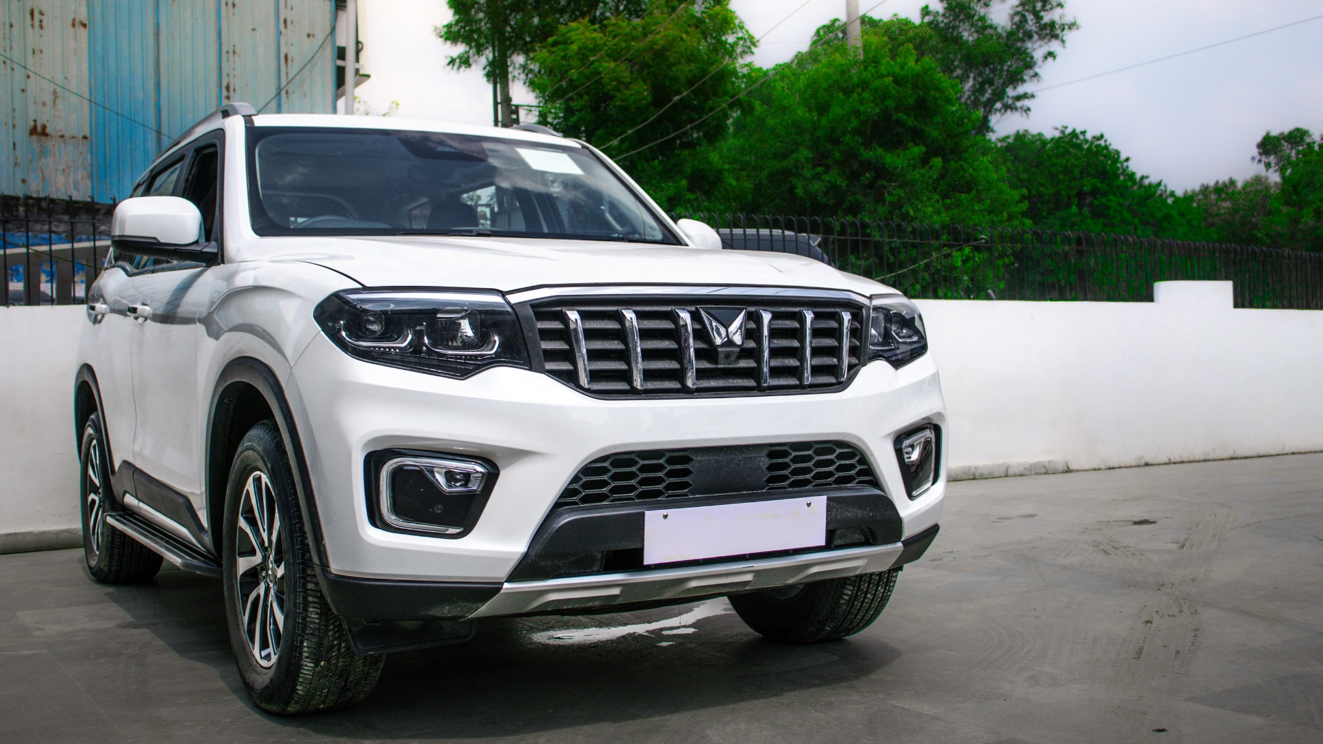 Scorpio N White side view fornt