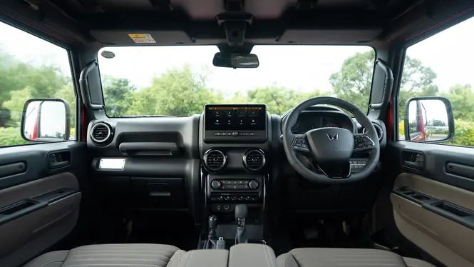 Mahindra Thar OG Interior Front Cabin showing dashboard, infotainment display, and steering wheel