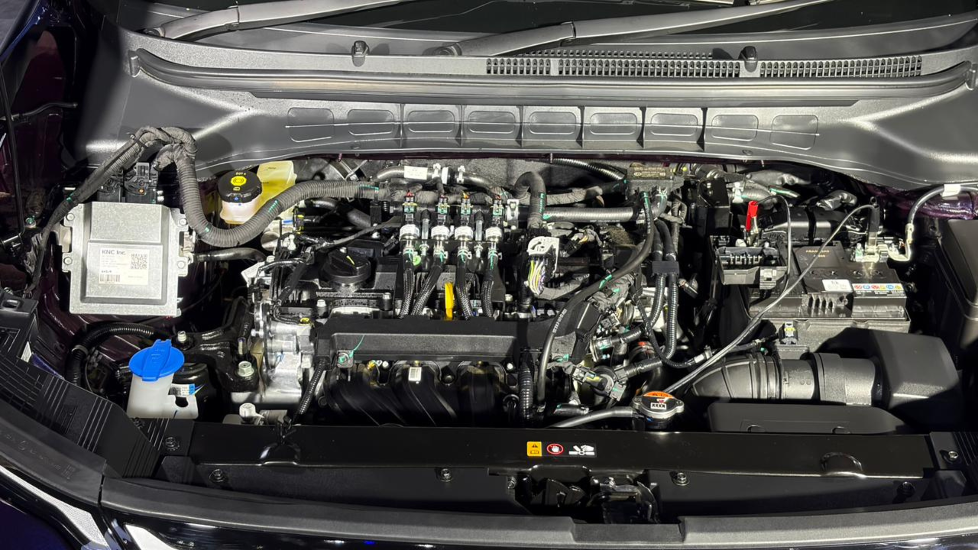 Kia Carens Clavis CNG engine view