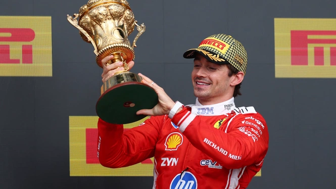 Charles Leclerc with British GP trophy