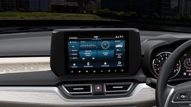 Maruti Suzuki Dzire's central dashboard touchscreen displaying a digital radio interface, time, date, and average speed data